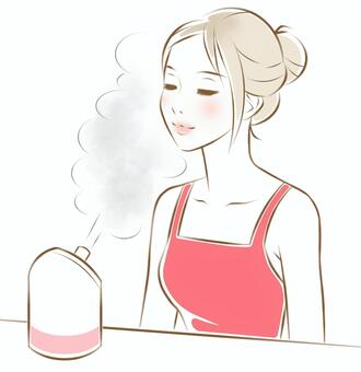 保湿器と女性